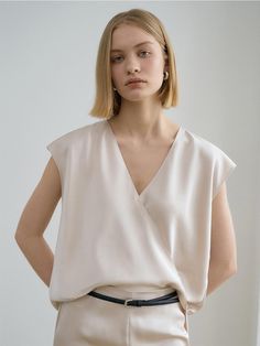 This is a trendy and feminine top by RENEJ that is made out of high quality and sturdy material. With distinctive mood of the design and comfortable wear, you can style it for your casual daily outfit.- Satin gloss of polyester fabric- V neckline and snap button- Unique and feminine mood Feminine Top, V Neckline, Daily Outfits, Snap Button, Polyester Fabric, Top Blouse, Top Outfits, Satin, Clothes For Women