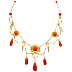 Very elegant and delicate necklace made out of 18 karat gold around 1870 in the neo archeological style. Fine fox tail chains alternate with coral beads and round gold disks reminiscent of targets. The disks, the larger one as centrepiece of the necklace and two smaler ones to either side are decorated with large coral boutons. More fox tail chains are suspended like garlands from the top row of gold chains. Every point of connection is accentuated by an articulated orient pearl with either a go Antique Yellow Gold Necklace With Historical Design, Antique Yellow Gold Necklace With Cabochon, Ceremonial Yellow Gold Necklace With Historical Design, Elegant Gold Necklace With Historical Design, Gold Art Nouveau Necklace For Formal Occasions, Gold Art Nouveau Necklaces For Formal Occasions, Art Nouveau Gold Necklace For Formal Occasions, Formal Art Nouveau Gold Necklace, Elegant Yellow Gold Necklace With Historical Design