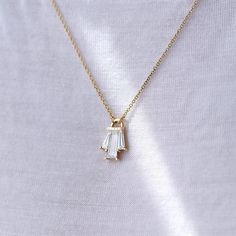 Tapered Diamond Bell Necklace - OOAK – ARTEMER White Pendant Necklace With Baguette Diamonds, White Baguette Diamond Pendant Necklace, White Diamond Pendant Necklace With Baguette Diamonds, White Diamond Baguette Pendant Necklace, Bell Necklace, Wedding 2025, Baguette Diamonds, Ethereal Beauty, Baguette Diamond