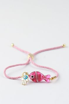 Murano Glass Fish Bracelet, lampwork pink fish jewelry, Beaded bracelet for kids and girls, handcrafted friendship bracelet, new year gift  Cute and minimal. It can be used for adults and children thanks to its adjustable rope feature. Bracelet is adjustable. Your orders will be delivered within 5 -7 working days after they are shipped. Minimalist Beads Jewelry, Pink Round Beads Charm Bracelet For Friendship, Pink Charm Bracelet With Round Beads For Friendship, Pink Adjustable Charm Bracelet For Friendship, Handmade Pink Charm Bracelet For Friendship, Pink Charm Bracelet For Friendship With Lobster Clasp, Adjustable Pink Bracelets As Gifts, Playful Pink Charm Bracelet For Gift, Playful Pink Charm Bracelet As Gift