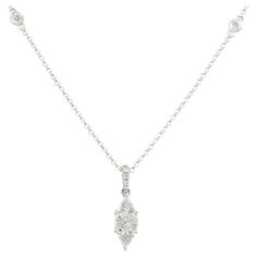 18k White Gold 0.71ctw Mosaic Marquise Cut Diamond Station Necklace Material: 18k White Gold Diamond Details: Approximately 0.71ctw of Marquise cut and Round Brilliant Diamonds. There are  Necklace Length: Adjustable from 17-18" Total Weight: 2.98g (1.91dwt) Additional Details: This item comes with a presentation box! SKU: A30316024 Luxury Marquise Diamond Necklace With Single Diamond, Luxury Marquise White Gold Necklace, Luxury Marquise Necklace For Anniversary, Luxury White Gold Marquise Necklace, Luxury Marquise White Gold Necklaces, Exquisite Silver Marquise Necklace, Wedding Platinum Marquise Necklace, Platinum Marquise Necklace For Wedding, Luxury Marquise Diamond White Necklace