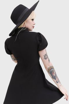 PENTAPHASE.- Smooth, stretch fabric.- Short puff sleeves.- Mini length.- Pentagram chest strap.- Pockets.- Back zip closure.- Fitted.With KILLSTAR branding, 72% Viscose 24% Polyamide 4% Elastane.Machine wash cold (30°c) / Do not bleach / Do not tumble dry / Iron at low temperature / Do not dry clean. Imported. Fitted Gothic V-neck Dress, Puff Sleeve Fitted Corset Dress For Costume Party, Fitted Gothic Mini Dress, Gothic Fitted Short Sleeve Mini Dress, Gothic Fitted Mini Dress With Short Sleeves, Vintage Fitted Corset Dress For Alternative Fashion, Fitted Black A-line Corset Dress, Fitted Short Sleeve Mini Dress For Costume Party, Fitted Short Sleeve Gothic Dress