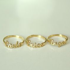 "14K Solid Gold Name Ring-Dainty Name Ring- Custom Stacking Name Ring - Birthday Gift- Bridesmaid-Gift For Mom-Gift For Her 14K Solid Gold Name ring will be handmade with your desired, Here is a dainty, delicate and simple, yet classy minimalist Name Ring . This is 14k Solid Yellow Gold. (this necklace is 100% real. It's not plated ) Perfect for everyday use. A beautiful customized gift for yourself or someone you care for. \"What's in a name?\" Spell out a name and let us create a beautiful gif Yellow Gold Initial Ring For Mother's Day Wedding, Yellow Gold Initial Ring For Wedding On Mother's Day, Yellow Gold Engraved Ring For Wedding And Mother's Day, Yellow Gold Engraved Wedding Ring For Mother's Day, Elegant Wedding Ring With Name, Yellow Gold Name Jewelry For Weddings, Personalized 14k Gold Birthstone Wedding Ring, Gold Rings With Names, Yellow Gold Engraved Ring For Wedding