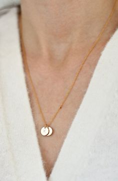 "Please note:  - Etsy delivery times are only an estimate, not a guarantee.  --- A B O U T --- Dainty 14K gold-filled necklace with the option of a blank or personalised disc.  Perfect as a gift for yourself or a loved one.  --- D E T A I L S --- Material: chain and pendant both are 14K gold filled Pendant size:  9mm diameter x 0.8mm thick  If you would like it personalised just leave a note when instructed by Etsy or in the notes section at check out. - Available in 16\" 18\" and 20\"  inch len Minimalist 14k Gold Filled Initial Necklace Gift, Dainty 14k Gold Filled Engraved Charm Necklaces, Customizable Minimalist Rose Gold Necklace, Minimalist Customizable Rose Gold Necklace, Minimalist Personalized Initial Necklace In 14k Gold Filled, Customizable Dainty Rose Gold Necklace, Dainty Customizable Rose Gold Necklace, Customizable Dainty Round Pendant Necklace, Dainty Customizable Round Pendant Necklace