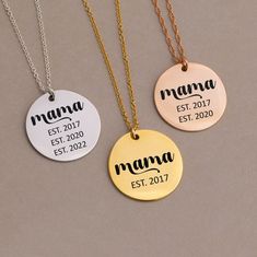 "MAMA est. Custom Engraved Necklace Gold, Christmas Kids Birthdays on Charm, Unique Rose Gold Necklace for Women, Engraved Disc Pendant 🌿 A beautiful laser engraved mirror finish round disc charm hanging from a real high quality 14k gold filled or 925 sterling silver chain. We offer a large collection of engraved disc charm necklaces so be sure to checkout all our options for Mother, Graduates, Nurses, Teachers and much more!  CLICK HERE FOR MORE OPTIONS: http://www.etsy.com/shop/delezhen?ref=condensed_trust_header_title_sold&section_id=37635303 Every piece arrives packaged on a custom card inside of an elegant box, complete with a polishing cloth & care instructions. These necklaces are meant to be gifted! H O W ∙ T O ∙ O R D E R 1st DROP DOWN menu * Select the METAL FINISH you would lik Customized Stainless Steel Necklaces For Mother's Day, Customizable Stainless Steel Necklaces - Gift For Mom, Customizable Stainless Steel Necklaces As Gift For Mom, Customizable Stainless Steel Necklace For Mom, Hand Stamped Round Disc Necklaces For Mother's Day, Customizable Round Pendant Charm Necklace For Mother's Day, Hand Stamped Round Disc Necklace For Mother's Day, Customizable Round Pendant Necklace For Father's Day, Mother's Day Laser Engraved Nameplate Jewelry