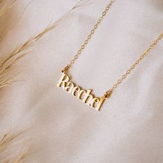 Discover the luxurious charm of the Malibu Name Necklace! Handcrafted with love and attention-to-detail, this gorgeous necklace is the perfect way to show off your name with style. Layer with your favorite necklaces for a boho glam look. NECKLACE FEATURES Choice of Finish: 18k gold plating over sterling silver or Sterling Silver handcrafted custom name pendant. Choice of Size: Small (approx. 3/4 inch) or Large (approx. 1.25 inches) Gold filled or sterling silver cable chain. All necklace finding Bohemian Personalized Necklaces For Everyday, Everyday Personalized Bohemian Necklaces, Everyday Bohemian Personalized Necklaces, Personalized Bohemian Charm Necklace With Pendant, Bohemian Personalized Charm Necklace Pendant, Bohemian Personalized Charm Pendant Necklace, Personalized Bohemian Charm Necklaces As Gift, Adjustable Name Necklace Gift, Personalized Bohemian Charm Necklaces For Gifts