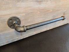 an old door handle is attached to a wooden cabinet with metal handles and knobs