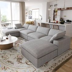 a living room with a sectional couch and coffee table