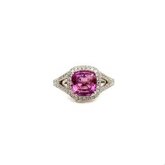 Check out this gorgeous 18k white gold ring set with a natural pink sapphire weighing 2.55 ct. Surrounding the pink sapphire are 78 round cut diamonds that weigh a total of 0.63 ct. The diamonds are G/H in color and VS2/SI1 in clarity. This ring is a beautiful addition to any wardrobe. Luxury Gia Certified Pink Sapphire Diamond Ring, Luxury Pink Ruby Ring In Platinum, Luxury Pink Ruby Ring With Halo Setting, Gia Certified Pink Diamond Ruby Ring, Pink Gia Certified Diamond Ring For Formal Occasions, Luxury Pink Sapphire Ruby Ring, Gia Certified Pink Sapphire Rings For Formal Occasions, Elegant Gia Certified Pink Sapphire Diamond Ring, Pink Sapphire Ring With Halo Setting For Formal Occasions