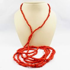 14 Karat Yellow Gold Long Necklace With 4MM Coral Beads with a Lobster Clasp. 72 Inches in length. Multi-strand Red Coral Necklace With Polished Beads, Red Coral Necklaces With Round Faceted Beads, Red Coral Necklace With Faceted Beads, Faceted Red Coral Necklace, Elegant Red Coral Necklace With Large Beads, Lariat Necklaces With Polished Beads For Jewelry Making, Elegant Hand-strung Oval Beads, Formal Long Single Strand Beaded Necklace, Multi-strand Red Coral Beaded Necklaces With Polished Beads