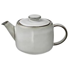 a silver tea pot with a lid