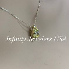 "This pendant is a pear shape yellow simulated diamond made with pure 14k yellow gold and 18\" yellow gold cable chain included item #5697 Approximate total carat weight: 2.00ctw diamond equivalent -Center Stone Size: 10x7mm -Gem Type: Simulated Diamond -Center Stone Shape: Pear Shape -Center Stone Color: Yellow -Center Stone Clarity: VVS1 -Metal Type and Purity: 14k Yellow Gold -Chain: 18\" delicate 14k gold chain / heavier option with lobster claw available (use dropdown to select) -Country of Yellow Gold Gemstone Drop Necklace For Anniversary, Teardrop Anniversary Drop Necklace In Fine Jewelry Style, Gold Teardrop Pendant Solitaire Necklace For Anniversary, Teardrop Fine Jewelry Drop Necklace For Anniversary, Pear-shaped Gemstone Drop Necklace For Anniversary, Pear-shaped Brilliant Cut Drop Necklace For Anniversary, Fine Jewelry Teardrop Drop Necklace For Anniversary, Pear-shaped Birthstone Drop Necklace, Anniversary White Gold Pear Drop Necklace