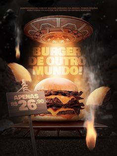 a burger sitting on top of a table next to a sign that says burger de outro mundo