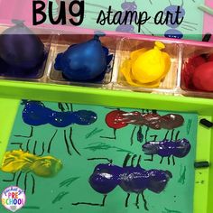 the bug stamp art box is filled with different colored paint