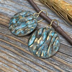 Unique Boho Inspired Vintage Patina dangle earrings-made with Natural Brass. Includes 10K Gold Plated Ear Wire and Silicone Earring Backs: These earrings are perfect if you are looking for that southwestern boho look. Throw them on with any outfit and they will definitely add some character. Perfect with a white T and a pair of jeans! These earrings are medium size, but very light weight and a perfect everyday wear. They are approximately 1.5 inches in length and 1 inch at the widest portion. To Bohemian Gold Earrings With Patina, Gold Bohemian Earrings With Patina, Artisan Earrings With Patina For Gifts, Artisan Earrings With Patina As Gift, Artisan Patina Earrings As A Gift, Handmade Bronze Drop Earrings, Gold Round Soldered Earrings, Gold Round Earrings With Soldered Details, Rustic Handmade Teardrop Earrings