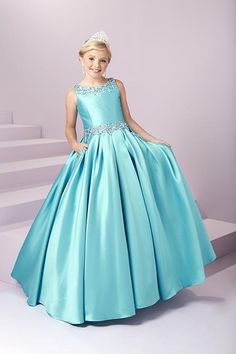 Expertly designed for the modern princess, the Tiffany Princess 13485 Girls Pageant Dress is a stunning Mikado A Line masterpiece. Embellished with intricate beadwork and featuring convenient pockets, this open back ball gown will make any young lady feel like royalty. <span data-mce-fragment=1>A beaded scoop neckline and waistband showcase this adorable gown. Complete with a box pleated, a-line mikado skirt with front Pockets, and an open back with lace-up.</span> Open Back Ball Gown, Lipstick Pink, Hot Pink Roses, Rose Lipstick, Modern Princess, Girls Pageant Dresses, Pageant Dress, Ball Gown, Scoop Neckline