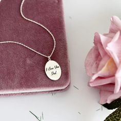 Capture the essence of your loved ones with our custom engraved fingerprint necklace – the perfect gift for loved ones. The deeply engraved design of this pendant allows you to feel the fingerprint as you touch the charm, creating a deeply sentimental piece. Give the gift for mom that not only looks beautiful but also holds a heartfelt significance. PROCESS - To acquire a fingerprint you can either use the traditional ink pad and paper, or scotch tape and pencil methods. Or you can also snap an image of the actual finger with your phone, just turn your flash off and make sure the image is in focus :) SIZE - 15mm HIGH DEMAND - All customs must go through a 3 step production process; molding, fitting, and electro-plating. This process takes 3-4 weeks, giving our necklace its great durability Elegant Laser Engraved Necklaces For Mother's Day, Elegant Necklace For Father's Day Personalized Gift, Engraved White Gold Necklace For Father's Day, Sterling Silver Oval Pendant For Personalized Gift, Sterling Silver Oval Pendant For Personalized Jewelry, Engraved White Gold Necklace, Sterling Silver Oval Pendant Jewelry For Personalized Gift, Minimalist Engraved Necklace For Keepsake, Elegant Hand Stamped Jewelry For Memorials