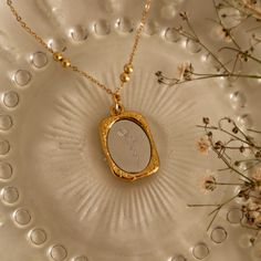 Introducing our Mirror, Mirror Birth Flower Necklace! With its unique mirrored design, this necklace beautifully showcases your birth flower. Be the fairest of them all with this one-of-a-kind piece. Gold Plated over Stainless Steel Pendant Size: 15/16" x 9/16" x 1/8" Chain Size: 17.71"+1.97'' ( 1.97 inches is the extension chain) Made in the USA by Anavia Mirror Necklace, The Fairest Of Them All, Birth Flower Necklace, Fairest Of Them All, Iris Flowers, Birth Flower, Mirror Mirror, Stainless Steel Pendant, Birth Flowers