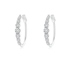 Graduated round diamonds are prong-set on these charming hoop earrings and exude breathtaking brilliance. Designed in 14k white gold, these hinged clip hoops are a gorgeous pair. Diamond Jewelry Earrings, White Diamond Earrings, Diamond Hoop Earrings, Fine Jewellery Earrings, White Diamond, Diamond White, Colored Diamonds, Diamond Bracelet, Round Diamonds