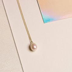 We’re picky about our pearls. Our collection of modern-feel pearl pieces takes your grandmother's favorites and incorporates them into the latest trends, interpreted from our NYC-gal perspective. These gem-quality pearls are freshwater cultured beauties, set in solid gold that won't tarnish or flake. We may have expensive taste, but crazy mark-ups aren’t really our thing. So we balance the best quality and the best price — enough said. 14k Solid yellow gold 9mm x 7mm Oval-shaped freshwater cultu Classic Everyday Pearl Drop Jewelry, Everyday White Gold Pearl Necklace, Modern Pearl Chain Jewelry, Modern Everyday Pearl Drop Jewelry, Elegant Drop Necklace With Pearl Chain, Classic Sterling Silver Pearl Necklace For Everyday, Modern Yellow Gold Necklace With Pearl Pendant, Luxury Pear Drop Necklace, Everyday White Gold Necklace With Pearl Charm