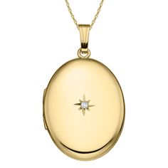 This oval gold filled locket is a perfect gift for anyone special in your life. Elegant with a genuine diamond in the center. This locket is packaged with a 14K gold filled rope chain that is 20" long. Made in the USA with a lifetime warranty. (20x25mm) Luxury Oval Pendant Locket Necklace, Classic Oval Locket Necklace Stamped 14k, Classic Gold Oval Locket Necklace, Oval 14k Yellow Gold Locket Necklace, Classic Yellow Gold Oval Locket Necklace, Yellow Gold Oval Locket Necklace For Anniversary, Classic Oval Locket Necklace For Keepsake, Classic Oval Locket Necklace, Yellow Gold Oval Locket Necklace