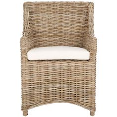 a wicker chair with a cushion on it