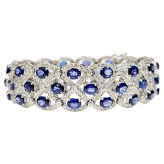 Indulge in the sublime beauty and timeless elegance of our Oval Blue Sapphire Bracelet, a striking masterpiece designed to grace your wrist with unparalleled sophistication. Immerse yourself in the enchanting world of gemstones as each rose-cut oval-shaped blue sapphire takes center stage, delicately cradled in a meticulous prong setting. These sapphires emanate an alluring depth of color and radiant brilliance that captivates the senses. The celestial allure of this bracelet is further accentua Blue Sapphire Bracelet, Bracelet Tennis, Sapphire Bracelet, Fine Jewels, Blue Gemstones, Tennis Bracelet, Rose Cut, Timeless Beauty, Arm Band