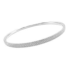 Tiffany & Co Metro 18k White Gold Full Diamond Three Row Bangle Bracelet $22,300   Retail Price: $22,300   Metal: 18k White Gold  Size: Medium 6.25"  Weight: 22.3 grams  Width: 4mm  Stones: Round Brilliant Cut Diamonds VS1 clarity, G color 2.98ct  Hallmarks: Tiffany&Co Au750 Belgium  Please reference the dimensions in the description for the best approximate dimensions. White Gold Round Bangle For Everyday Luxury, Timeless Gold Bracelet With Pave Setting, Luxury Round Bangle With Pave Setting, Formal Pavé Setting Bangle, Elegant Bangle Bracelet With Pave Setting, Hand Set White Gold Bangle In Fine Jewelry Style, Timeless Pave Setting Bracelets, Timeless White Gold Bangle With Pave Setting, Luxury Bangle Bracelet With Pave Setting