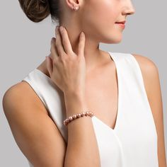 This bracelet consists of 8.5-9.5mm AAA quality freshwater pearls with 'Very High' luster, our highest grade available. The brilliant pink color of this bracelet would also go great with one of our exquisite lavender freshwater necklaces. The pearl bracelet is affixed with a beautiful 14K white or yellow gold clasp of your choice. Elegant Rose Gold Pearl Bracelet With Round Beads, Elegant Pink Hypoallergenic Beaded Bracelets, Classic Pink Bracelets, Elegant Pink Hypoallergenic Bracelet, Elegant Pink Pearl Beaded Bracelets, Rose Gold Pearl Bracelet With Pearl Charm, Elegant Pink Pearl Bracelet As A Gift, Elegant Pink Round Beaded Bracelets, Elegant Pink Pearl Bracelet For Gifts