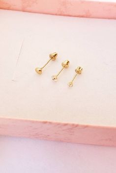 "14k GOLD STUDS SCREW Back Tiny CZ Safety Ball Backs Children's earrings Threaded back earring Hypoallergenic jewelry Multiple piercing Gift Teeny tiny Baby studs Small Real 14K gold Studs birthday gift for a baby 1st birthday Delicate and cute handmade with love: - 2mm - 3mm -3.5mm - cubic zirconia studs - round cut CZ set in 4 prongs - solid 14K yellow gold setting - soft ball threaded ball backs for comfort and no pain against the skin. 4 STYLES AVAILABLE: -2mm PRONG SET 14k yellow gold ( 8.1 Hypoallergenic Gold Cartilage Earrings As Gift, Hypoallergenic Gold Cartilage Earrings For Gift, Adjustable Gold Cartilage Earrings As Gift, Classic Gold Cartilage Earrings As A Gift, Classic Gold Cartilage Earrings For Gift, Dainty Gold Piercings With Birthstone, Gold Plated Piercings As Gift, Gold-plated Piercings As Gift, 14k Gold Filled Piercings