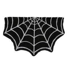 a black and white spider web rug