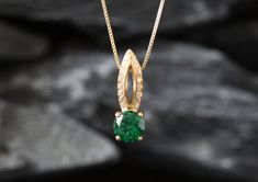 Gold Emerald Pendant set with a Created Emerald in a perfect diamond cut, flawless clarity & deep green color, at 7mm diameter, weighing 1.5 Carat. Antique Necklace design made of Gold Vermeil ☞ thickest 18k Gold Plating on top of Solid 925 Sterling Silver ☞ made to last. Free Gold Vermeil Chain with every Pendant order, 18 inch Silver chain (46 cm) ✓ Matching Ring: www.etsy.com/listing/773807404 Matching Earrings: www.etsy.com/listing/857803534 ⌛Last Pendants left ⌛ Details :  ♥ Each item comes Green Pendant Necklace With Prong Setting, Green Diamond Cut Necklace For Anniversary, Green Pendant Necklaces With Prong Setting, Anniversary Green Diamond Cut Necklace, Green Brilliant Cut Necklace For May Birthstone, Green Necklaces With Prong Setting For May Birthstone, Green Diamond Cut Emerald Pendant Necklace, Green Gemstone Round Cut Necklace, Green Gemstone Necklace With Round Cut