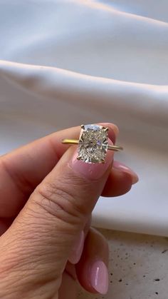 Cushion Cut Moissanite Engagement Ring, Promise Engagement Ring, Cushion Cut Solitaire, Solid Gold Cushion Cut, Solitaire Proposal Ring. ✦Description of Ring 💎 Center Stone Details 💎 → Shape: Elongated Cushion Cut → Size: 3.50 CT → Color: ColourLess → Clarity: VVS1 → Luster: Excellent → Make: High Quality The stones in jewelry are 100% hand-crafted it is cut and polished by our experienced craftsman. Moissanite is the best alternative to diamond. ✦ We Hiyaan jewels happily accept customized or Cushion Engagement Ring Silver, Antique Cushion Engagement Rings, Cushion Cut Wedding Ring, Elongated Cushion Engagement Ring, Engagement Ring Cushion Cut, Cushion Cut Wedding Rings, Cushion Cut Moissanite Engagement Ring, Engagement Ring Cushion, Moissanite Engagement Ring Cushion Cut