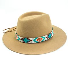 Price includes a Lola Sambboho hat & an Aztec Flat hatband. Save 10% with this bundle. Select hat size. Hatband is one size fits all. Hatband is removable. An iconic must-have Fedora hat that will never get out of fashion. Sambboho's Lola hat has a soft brim and indented crown. A chic piece to be worn at all seasons of the year. The timelessness chic and sophistication exuded by this hat make it a lifetime wardrobe investment you’ll never regret! Classic Fedora design in Sand color Trimmed w Brown Adjustable Sun Hat With Flat Crown, Casual Hat Band With Adjustable Flat Crown, Brown Adjustable Hat For Festivals, Adjustable Brown Hat For Festivals, Adjustable Brown Hat For Festival, Adjustable Flat Crown Sun Hat For Rodeo, Bohemian Adjustable Panama Hat With Flat Brim, Bohemian Adjustable Panama Hat With Curved Brim, Bohemian Panama Hat With Adjustable Short Brim