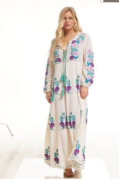 The Lara Embroidered Maxi Dress Natural/ Multicolor is a one-of-a-kind piece that will make you stand out in any crowd. This dress is perfect for those warm midsummer nights, with its lightweight fabric and flowy silhouette. The long sleeves add a touch of sophistication, while the embroidered floral motifs in shades of blue and purple add a pop of color and femininity. What sets this dress apart is its unique combination of natural and multicolor tones. The earthy natural color of the dress is Embroidered Maxi Dress, Floral Motifs, Floral Motif, Lightweight Fabric, Natural Color, Shades Of Blue, Blue And Purple, Color Pop, The Dress