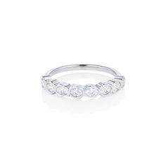 Add some sparkle to your fine jewelry collection with our White Diamond Abstract Bezel Band. Featuring 0.45tcw of oval white diamonds, this band feels modern yet classic and looks great stacked or solo. Bezel Band, Fine Jewelry Collection, Bezel Diamond, Oval Diamond, White Diamonds, White Diamond, Diamond White, Jewelry Collection, Fine Jewelry