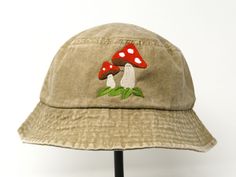 Item: flower embroidered bucket hat Material: 100% cotton Size: one size fits most Embroidery: machine embroidered Customization is open, please let me know if you want the design on a different color hat. Free first class shipping, upgradable priority mail service. 30 days return policy, feel confident at your purchase! Adjustable Bucket Hat With Embroidered Logo, Adjustable Bucket Hat With Embroidered Logo And Short Brim, Embroidered Logo Bucket Hat, Embroidered Cotton Bucket Hat, Embroidered Cotton Bucket Hat With Curved Brim, Embroidered Adjustable 5-panel Hat, Adjustable Embroidered 5-panel Hat, Embroidered Adjustable Bucket Hat, Adjustable Embroidered Bucket Hat