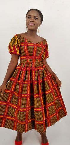 This beautifuldress is handmade with vibrant African print. The bodice is lined and it is fitted with zipper at the back. Buyers can request customization if measurement is different from standard. Dress length from the waist Midi- 31 inches (as pictured) Knee-25 inches Please allow 7 to 10 business days for production, standard shipping takes 10-20 business days to deliver. Color may be different due to your monitor Packing: in order to save your shipping cost, each dress will be packed tightly Red Fitted Ankara Dress, Fitted Multicolor Sweetheart Neckline Dress, Yellow Fitted Ankara Fabric Dress, Fitted Multicolor Ankara Fabric Midi Dress, Fitted Multicolor Ankara Fabric Dress, Fitted Multicolor Ankara Dresses, African Midi Dress, Black Wedding Guest, African Head Scarf