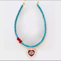 Turquoise Bead Chain Spring Clasp Pave Crystal Added Red Unique Beads With A Red Enamel Heart Evil Eye Charm Love Love Love This One ! Beaded Choker Heart-shaped Colorful Beads For Gifts, Valentine's Day Red Beaded Necklaces, Bohemian Beaded Necklace With Heart Beads, Heart-shaped Bohemian Beads For Gifts, Bohemian Heart-shaped Beads For Gifts, Bohemian Heart-shaped Gift Beads, Red Heart-shaped Beaded Necklaces, Adjustable Blue Heart Beaded Necklaces, Blue Adjustable Heart-shaped Beaded Necklaces