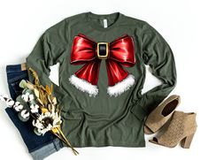 Christmas Coquette Christmas Sweatshirt, Christmas Bow Sweater, Holiday Crewneck, Cute Winter Sweatshirt, Women's Holiday Party Shirt, Xmas 📢Please Check All Photos For Details.   📢Choose Your T-Shirt Size From The Drop-Down Lists Next To The item Picture   📢Choose Of Your T-Shirt Color From The 2nd Picture   📢Use "Add message to Seller" link On The Checkout Page To Send me the Following important Details For Your Order's Customization.   📢Shipping Time Varies by location (we are located in Holiday Crewneck, Christmas Coquette, Coquette Christmas, Bow Sweater, Christmas Bow, Winter Sweatshirt, Sweatshirt Christmas, Christmas Bows, Display Design