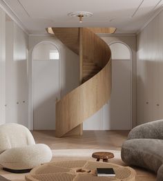 a spiral staircase in the middle of a living room