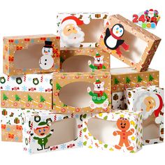 several christmas themed boxes stacked on top of each other with santa claus and snowmen