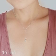 "From my original Delicate Rosary series! A fashion forward, feminine necklace that is perfect for every day! This necklace is my personal fave every day necklace: Lightweight and delicate yet full of sparkle! A teeny tiny, feather light sterling silver cross is strung on sparkling sterling silver chain. Also available in 14K Gold Fill. Necklace shown on model measures 16\". Dangling charm measures an additional 1.75\" Tiny charm measures approx 6mm x 4.5mm ► All NINA KUNA jewels come in a compl Every Day Necklace, Extra Long Necklace, Feminine Necklace, Tiny Cross, Tiny Charm, Necklace Extender, Y Necklace, Feather Light, Sterling Silver Cross