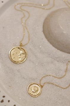 A gold rotating necklace which features the face of the sun on one side and the face of the moon on the other. Comes in 2 sizes. Small charm is 1” wide and hangs from a 16” chain Big charm is 1.5” wide and hangs from a 21” chain Moon Gold, Gold Sun, Small Charms, Beautiful Stories, Sun And Moon, Coin Necklace, Moon Pendant, Coin Pendant, Private Event