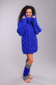 "Brand new chunky knit Sweater in Royal blue Color. Turtleneck collar. Super chunky and warm. This super big and trendy sweater is soft and warm. Easy to combine with jeans /skirts. Matching leg warmers available. Materials : Soft premium quality soft bulky wool. Color: Royal blue Measurements : Body length: 28 \" / 72 cm Chest width: 20,5 \" / 52 cm Sleeve measured from the neckline to the end of the cuff: 28 \" / 71 cm Neck unrolled - 16''/ 40 cm All the measurements are taken with the item fl Blue Turtleneck Plus Size, Cozy Knitted Turtleneck For Cold Weather, Oversized Blue Turtleneck Sweater, Winter Chunky Knit Sweater, Blue Cozy Knitting Pattern For Fall, Winter Blue Turtleneck With High Neck, Cozy Blue Knitting Pattern For Fall, Blue Oversized Turtleneck Sweater, Winter Cable Knit Sweater With Funnel Neck