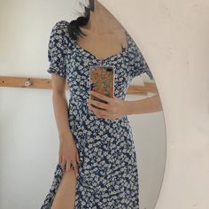 Experience the joy of summer with our Floral Bloom Split Midi Dress. This breezy and flowy dress features a beautiful floral pattern and a flattering split design, perfect for any warm weather occasion. Elevate your style and embrace the summer vibes with tthis midi dress. ☀️🌼 Size Chart: Size Bust (cm) Shoulder (cm) Sleeve (cm) Length (cm) Bust (in) Shoulder (in) Sleeve (in) Length (in) S 88 35 27 105 34.65 13.78 10.63 41.34 M 92 36 28 106 36.22 14.17 11.02 41.73 L 96 37 29 107 37.80 14.57 11. Ditsy Floral Print Midi Sundress For Day Out, Trendy Floral Print Midi Dress For Vacation, Ditsy Floral Midi Sundress For Day Out, Midi Sundress With Ditsy Floral Print For Day Out, Trendy Ditsy Floral Print Summer Dress, Ditsy Floral Print Midi Sundress, Ditsy Floral Print Maxi Sundress For Day Out, Casual Midi Sundress With Ditsy Floral Print, Midi Sundress With Ditsy Floral Print