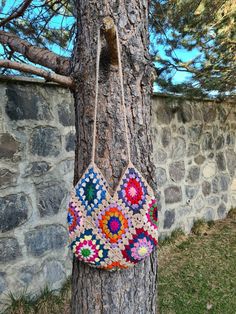 "I crochet grandmother's knitted bags for you. This wonderful crochet bag is the perfect accessory for your summer and winter outfit. Summer is so close and the sun is shining everywhere, it's time for summer fashion :) -This wonderful crochet bag is the perfect accessory for your summer winter outfit. -Soft and bright colors in adorable granny square shape. -The crochet bag has enough space for all your belongings :) -Entirely handmade crochet by me after my own design. -The crochet bag is a gr Rectangular Knitted Shoulder Bag For Beach, Knitted Rectangular Shoulder Bag For Beach, Knitted Rectangular Beach Bag, Natural Crochet Bag For Festival, Natural Crochet Festival Bag, Beige Granny Square Bags For Vacation, Handmade Crochet Tote Bag For Crafting, Square Multicolor Handwoven Crochet Bag, Multicolor Rectangular Yarn Bag