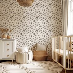 a baby's room with floral wallpaper and crib in the foreground