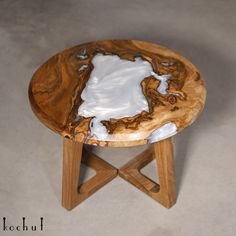 a wooden table with white paint on it