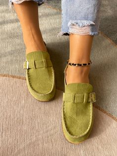 A stunning strap decorates the top of this mule to provide a sleek accent to your on-the-go ensemble. PU upper Man Made lining Cork footbed Man-made sole Suede Slip-on Mules With Buckle Closure, Casual Slip-on Mules With Buckle Closure, Chic Slip-on Mules With Textured Footbed, Casual Slingback Mules For Work, Trendy Flat Heel Mules With Buckle Closure, Trendy Round Toe Mules With Buckle Closure, Trendy Mules With Buckle Closure And Round Toe, Casual Flat Mules With Buckle Closure, Green Slip-on Mules